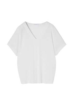 Witte korte mouw V-hals T-shirt gemaakt van zachte stof. Kenmerkt zich door een ontspannen pasvorm en subtiele textuur. Minimalistisch en veelzijdig ontwerp.
