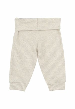 Lichtbeige kinderpants van geweven stof, met een brede elastische tailleband en taps toelopende enkels. Geen zichtbare patronen of versieringen.