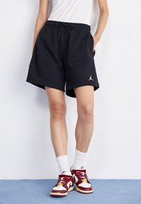 Jordan Pantalon de survêtement - black/white