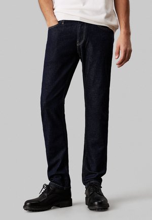 Slim fit jeans - denim rinse