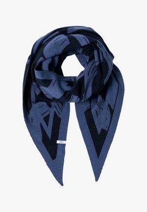 Sciarpa lavorata a maglia con una combinazione di colori blu e navy e motivi astratti. Texture morbida, punte triangolari e etichetta del marchio visibile.