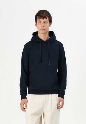 Navy blue hoodie in soft, textured fabric features a drawstring hood, front pocket, and ribbed cuffs and hem. Suitable for casual wear.