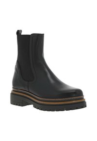 Bottines en cuir noir avec côtés élastiques, motif texturé, semelle épaisse et contraste de couture marron. Conçues pour un enfilage facile.