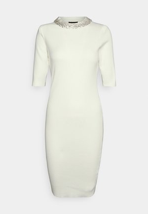 White knee-length fitted dress with short sleeves and a round neckline adorned with silver bead embellishments.