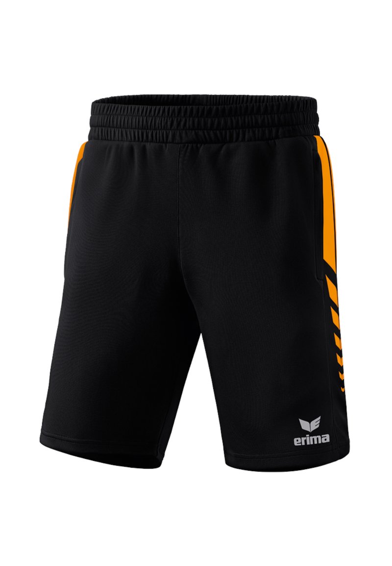 Pantaloni sportivi neri realizzati in materiale leggero, con dettagli laterali arancioni e il logo "erima" nella parte inferiore destra.
