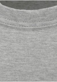 Gray cotton t-shirt featuring a crew neckline, smooth texture, and visible stitching detail along the collar.
