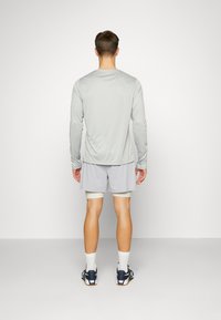 ICANIWILL STRIDE - Šortai „du viename“ - light blue