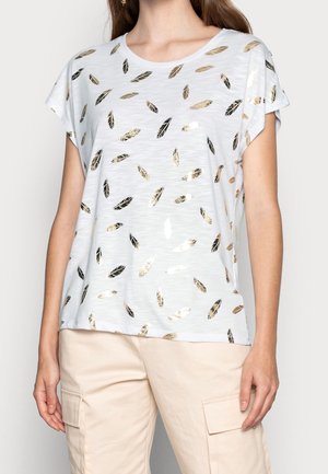 Valkoinen lyhythihainen t-paita rentoa istuvuutta, jossa on metallinhohtoisia kultaisia ja mustia sulkakuosisia kuvioita kangasalla. Sileä pinta.