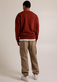 America Today Sweatshirt - brown