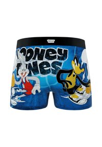 Boxers pour garçons en bleu avec un motif en maille, présentant des graphismes de Bugs Bunny et Daffy Duck. Taille élastique noire. Matériau en polyester.