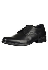 Scarpe da dress in pelle nera con punta arrotondata, design con lacci e tacco basso. Presentano una finitura liscia e un marchio discreto.