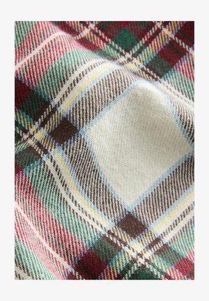 Tessuto a scacchi con fili intrecciati di rosso, verde, blu, giallo e marrone su uno sfondo crema con una finitura texturizzata.