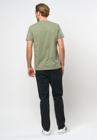 U.S. Polo Assn. ARJUN - Pamata T-krekls - sea spray