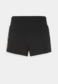 Černé sportovní šortky vyrobené z bavlněné směsi. Mají elastický pas a malé logo potisknuté na jedné straně.