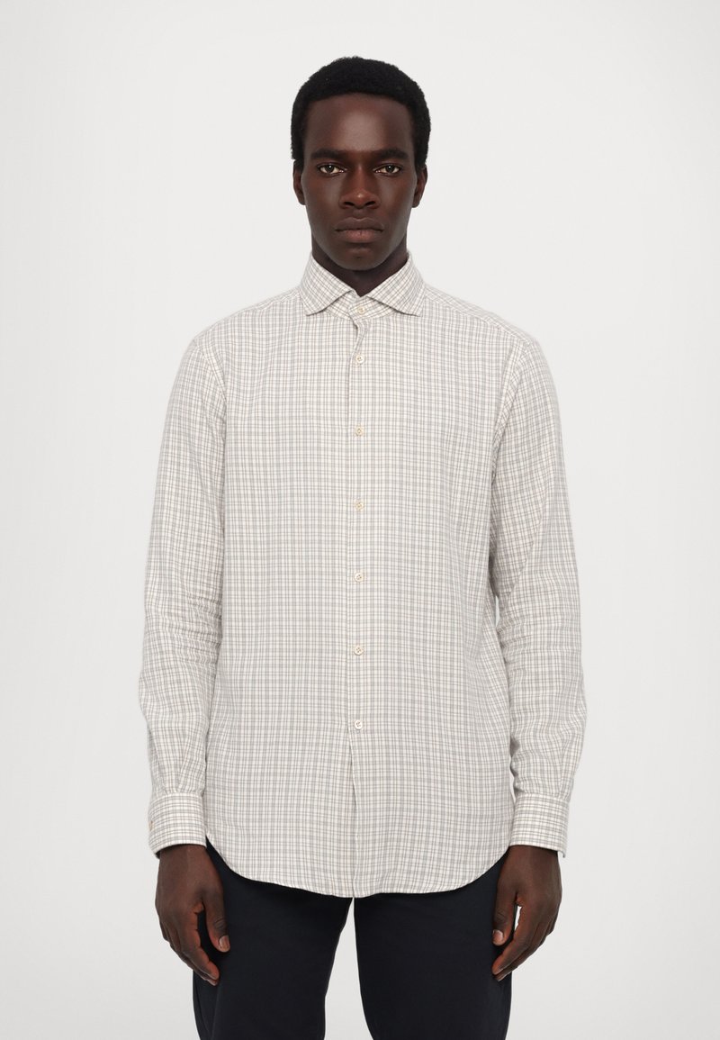Lightweight, long-sleeve checkered shirt in beige and gray, featuring a button-up front and soft texture, with a classic collar design.