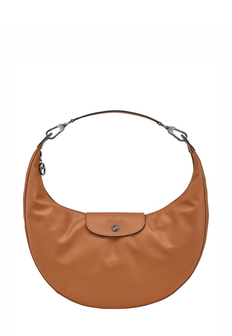 Brown crescent-shaped leather handbag with a single strap, flap closure with a button, and metal clasp attachments.