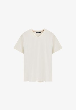 V-Ausschnitt, kurzärmliges T-Shirt aus elfenbeinfarbener Baumwolle, mit einem dezenten Logo auf der Brust und einer lässigen Passform mit gerader Säume.