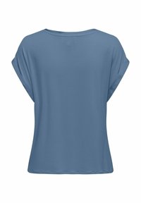 Top blu, a maniche corte, con una vestibilità rilassata, realizzato in tessuto morbido. Presenta un collo arrotondato e una texture liscia.