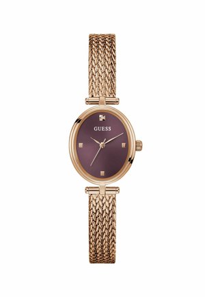 Montre en or rose avec un bracelet texturé et un cadran rond violet foncé, comportant des accents dorés et des index carrés. Nom de la marque affiché.