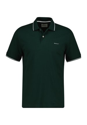 Tmavě zelené polo tričko vyrobené z bavlny, s dvoubodovým zapínáním, krátkými rukávy, bílými akcentními proužky na límci a rukávech a logem.