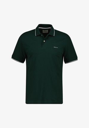 Dunkelgrünes Polohemd aus Baumwolle, mit einem Zweiknopfverschluss, kurzen Ärmeln, weißen Akzentstreifen am Kragen und an den Ärmeln sowie einem Logo.