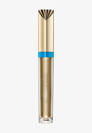 Kultainen ripsiväri-tube, jossa on raidallinen korkki ja sininen vyö, nimeltään "MAX FACTOR X MASTERPIECE HIGH DEFINITION MASCARA."