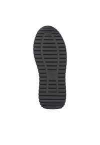 Suela de goma negra con estrías horizontales y verticales para tracción, presenta una puntera redondeada y una textura suave. Sin logotipos ni patrones visibles.