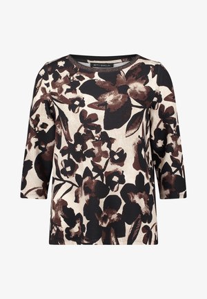 Bluzka w kwiatowy wzór z rękawami 3/4, z ciemnobrązowymi i czarnymi kwiatami na kremowym tle. Miękka, teksturowana tkanina.