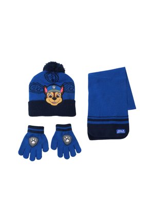 Blue winter set with hat featuring a cartoon dog face and pom-pom, matching gloves with paw patches, and a striped scarf labeled "Paw Patrol."