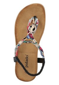 Colorful flat sandal with a patterned fabric strap, gold-tone circular accent, and a textured brown footbed, featuring a black elastic heel strap.