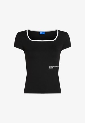 Mustapaita, jossa on neliökaula-aukko, lyhyet hihat ja valkoinen viimeistely. Alhaalla vasemmalla puolella on "KARL LAGERFELD JEANS" -logo.