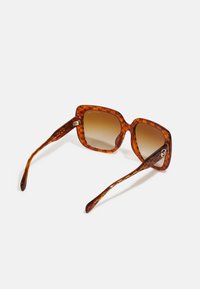 Michael Kors MALLORCA - Aurinkolasit - amber heritage