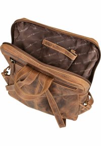 Sac en cuir brun avec fermeture éclair, comprenant une poche intérieure et une doublure à motifs. Il dispose de deux poignées et d'une bandoulière.