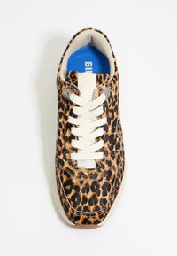 Leopard print sneaker with a textured fur-like upper, cream laces, padded tongue, and a blue insole; rubber sole with light brown accents.