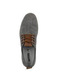 Gray fabric shoe with a rounded toe, brown laces, and a beige sole. Features a logo and size printed on the insole.