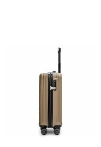 Maleta rígida compacta en color beige con cremallera negra, cuatro ruedas giratorias y asa telescópica extensible.