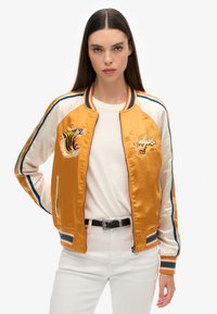 Superdry & Co IKAJAN pomarańczowy