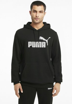 Zwarte hoodie van een katoenmix, met een groot wit Puma-logo op de voorkant en een kangoeroezak. Lange mouwen met ribgebreide manchetten.