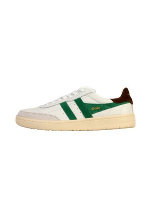 White sneakers with green and brown accents, featuring a textured surface, round toe, and a textured rubber sole. Gold logo on the side.