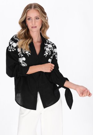 Gombos blúz - black