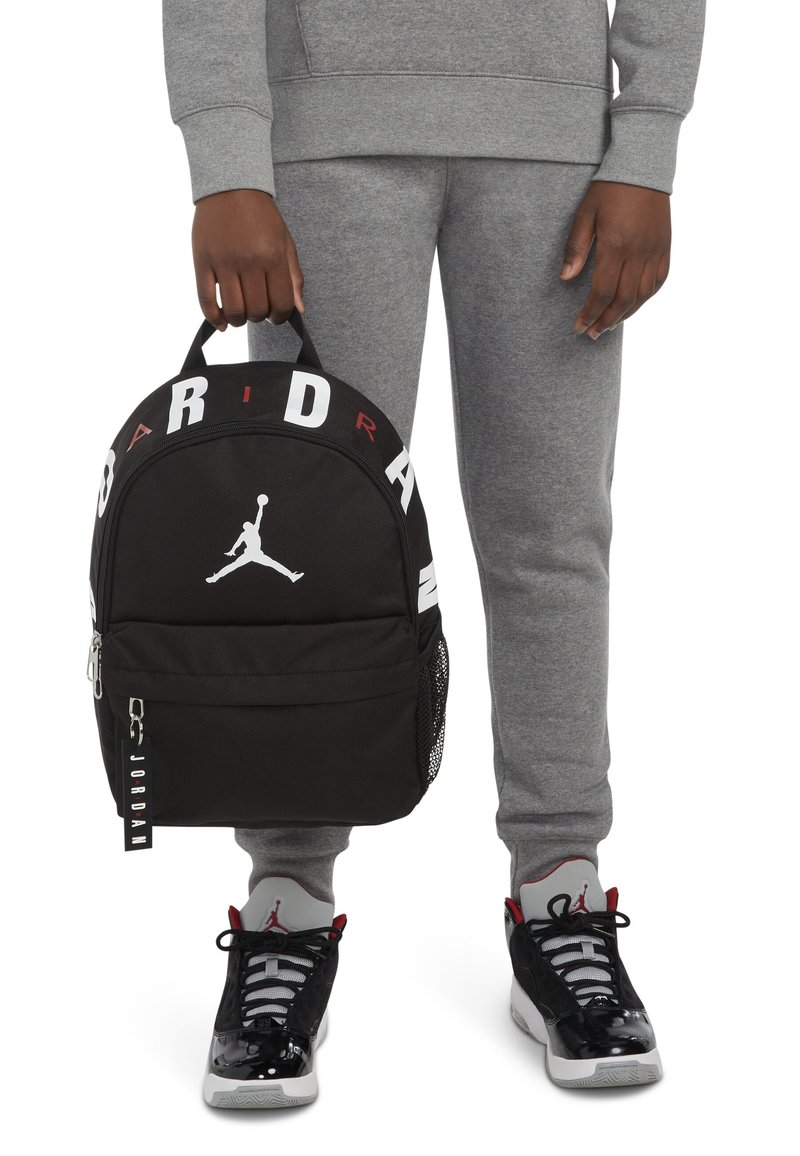 jordan air mini backpack in black This compact Jordan bag gives you just enough room for books Jordan Air Lunch Black Backpack,