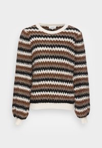 Brun, svart och vit randig tröja med rund halsringning samt ribbade muddar och nederkant. Mjuk, strukturerad tyg med ett sicksackmönster.