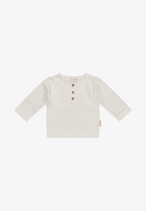 White long-sleeve baby shirt with round neckline and three small brown buttons on the front placket.