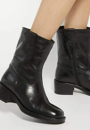PAYTYN - Snowboots  - black