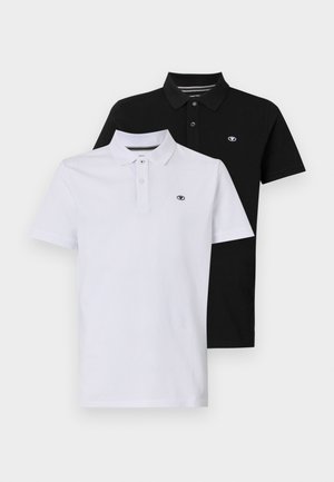 Due polo shirt in bianco e nero. Realizzate in cotone, con maniche corte, polo con tre bottoni e un piccolo logo sul petto.