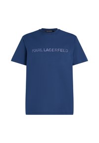 Mėlynas medvilnės T-shirt su trumpomis rankovėmis ir apvaliu iškirpimu. Papuoštas toniniu iškilniu "KARL LAGERFELD" logotipu per krūtinę.