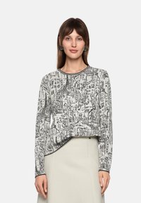 Graphic long-sleeve top in light gray featuring a detailed black cityscape print, round neck, and relaxed fit with a slightly curved hem.