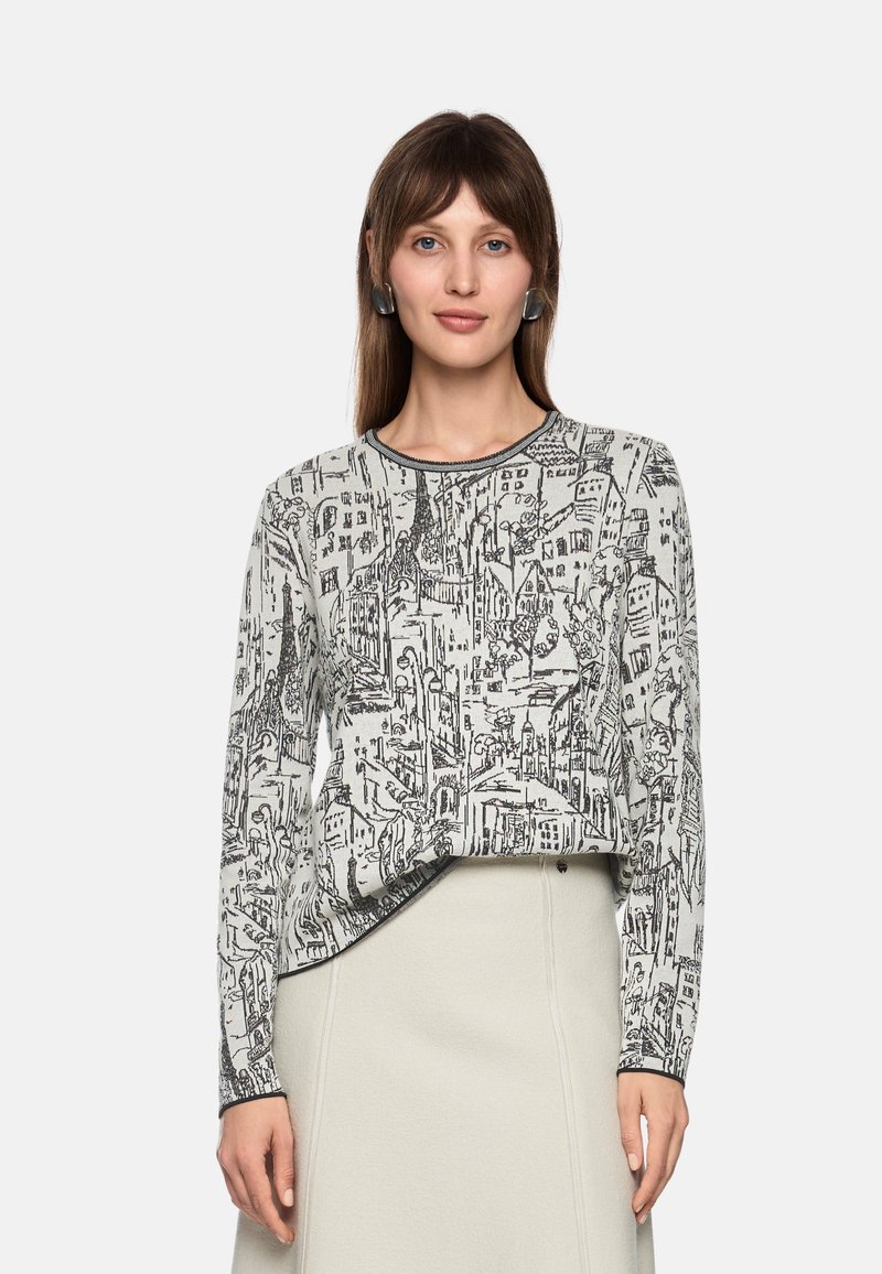 Graphic long-sleeve top in light gray featuring a detailed black cityscape print, round neck, and relaxed fit with a slightly curved hem.