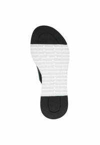 Suola di sandal nero e bianco con aree di presa nera testurizzata sul tallone e sulle dita, e una sezione centrale bianca a motivo per la trazione.