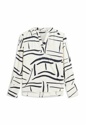 Witte blouse met lange mouwen, voorzien van een zwart abstract penseelstreekpatroon en een V-halskraag, plat gelegd op een witte achtergrond.